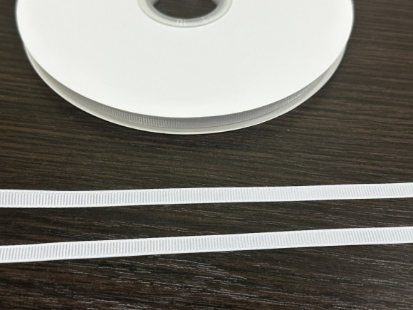 Стрічка репс 0,6 см. 92 м. № 1001/01